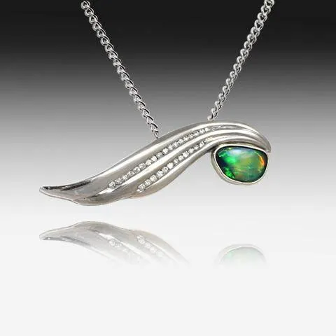 18KT WHITE GOLD BLACK OPAL AND DIAMOND PENDANT
