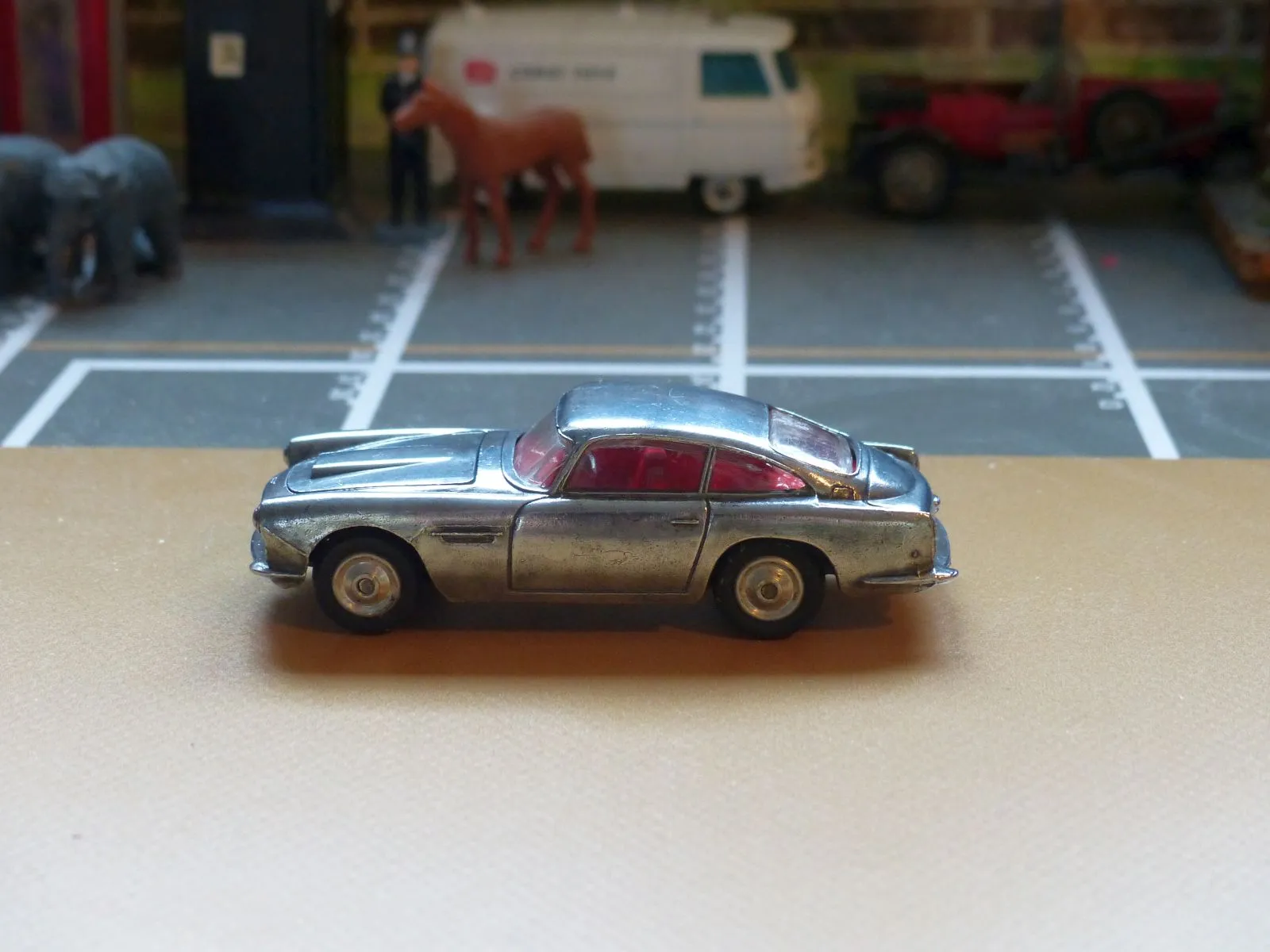 218 Aston Martin in polished bare metal
