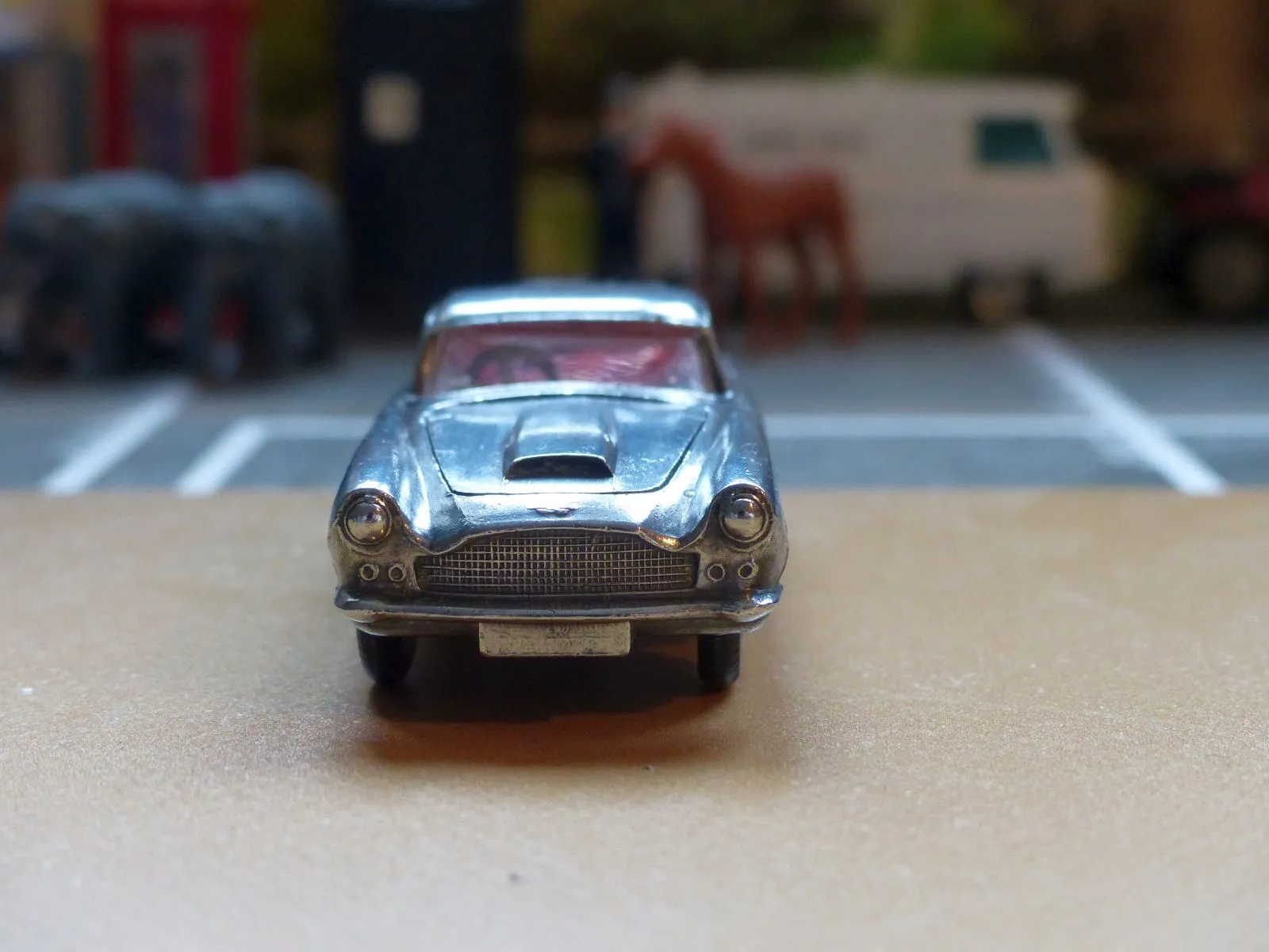 218 Aston Martin in polished bare metal