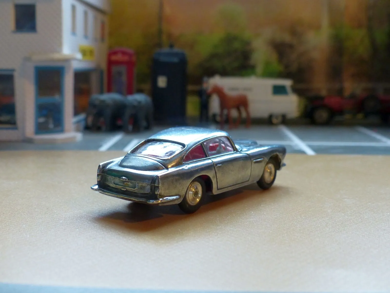 218 Aston Martin in polished bare metal