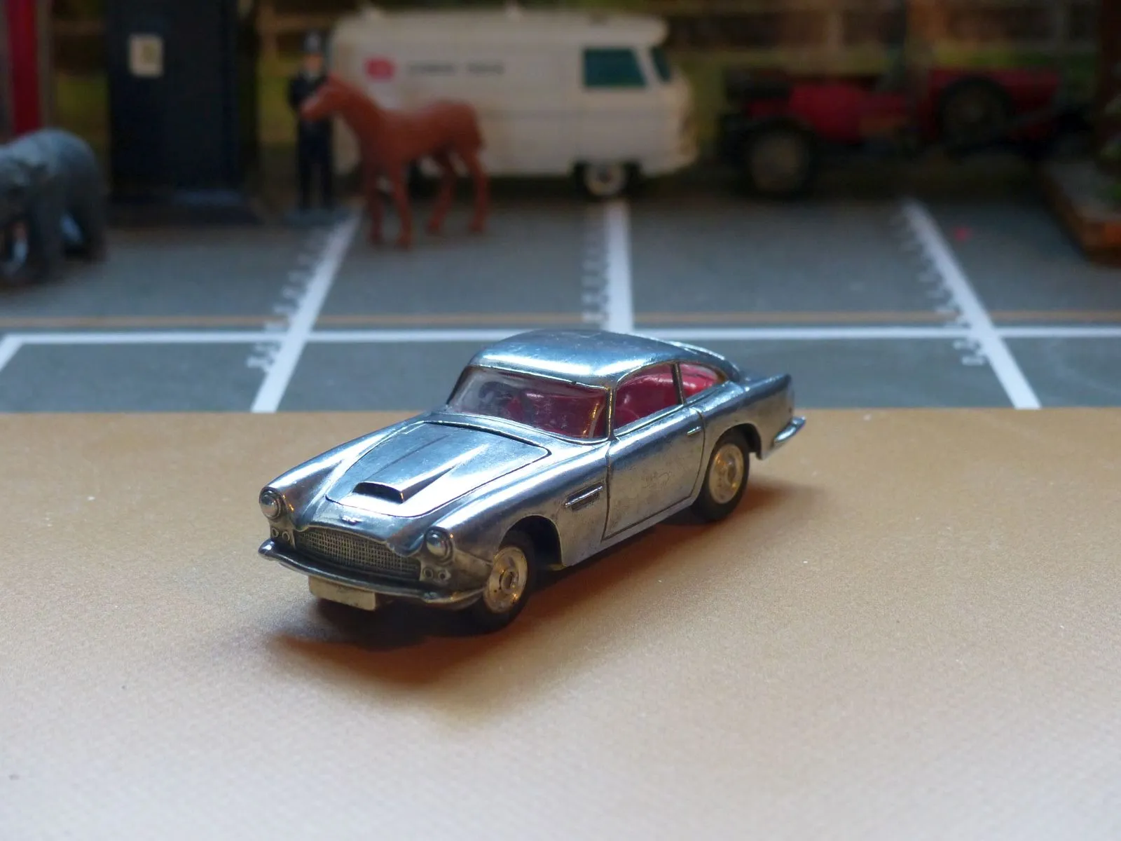 218 Aston Martin in polished bare metal