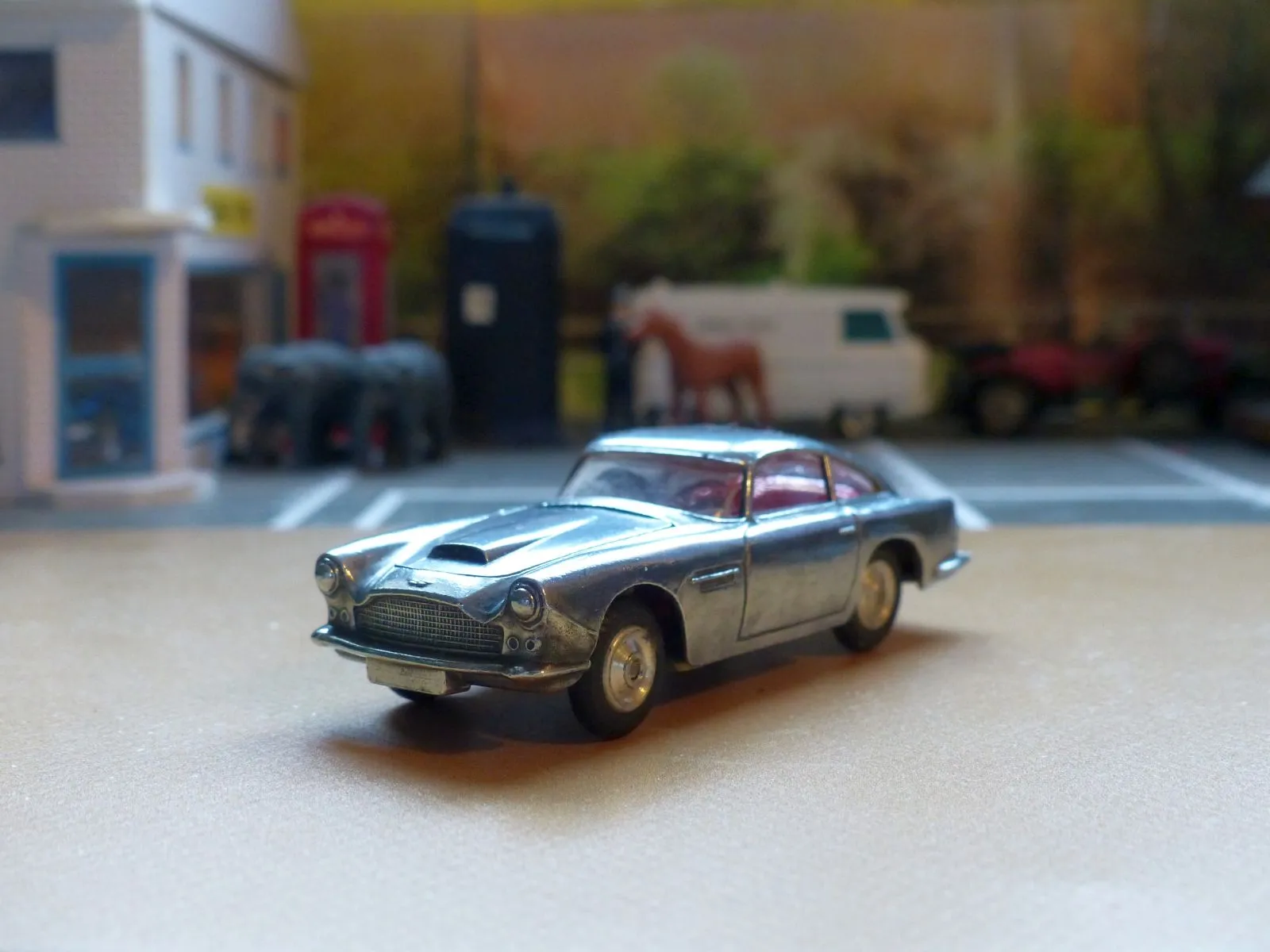 218 Aston Martin in polished bare metal