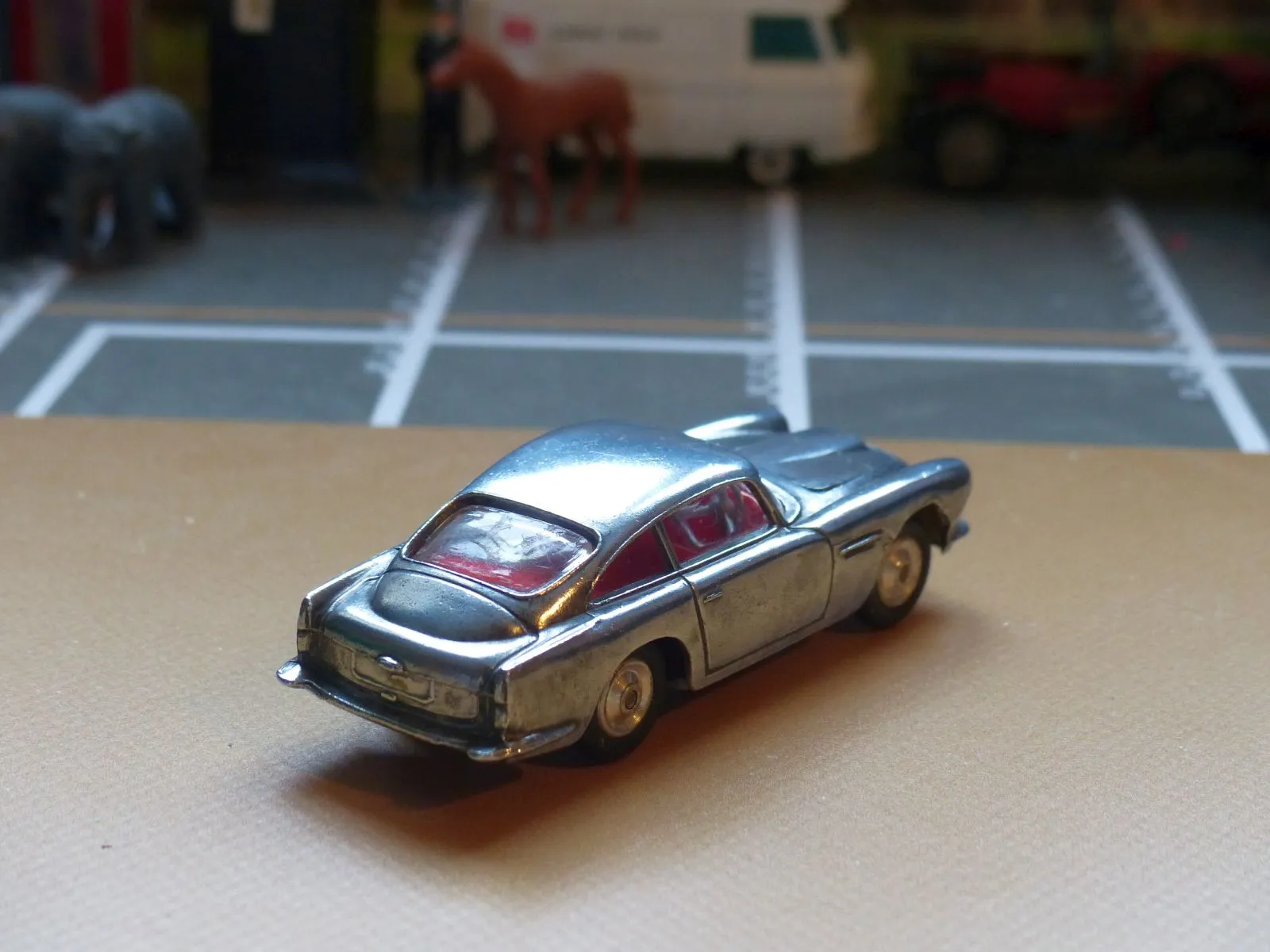218 Aston Martin in polished bare metal
