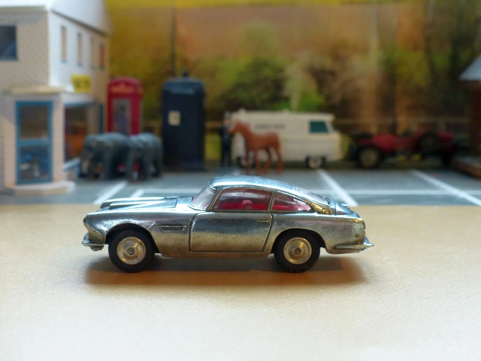 218 Aston Martin in polished bare metal