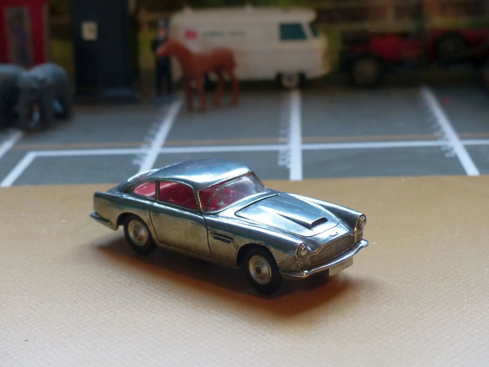 218 Aston Martin in polished bare metal