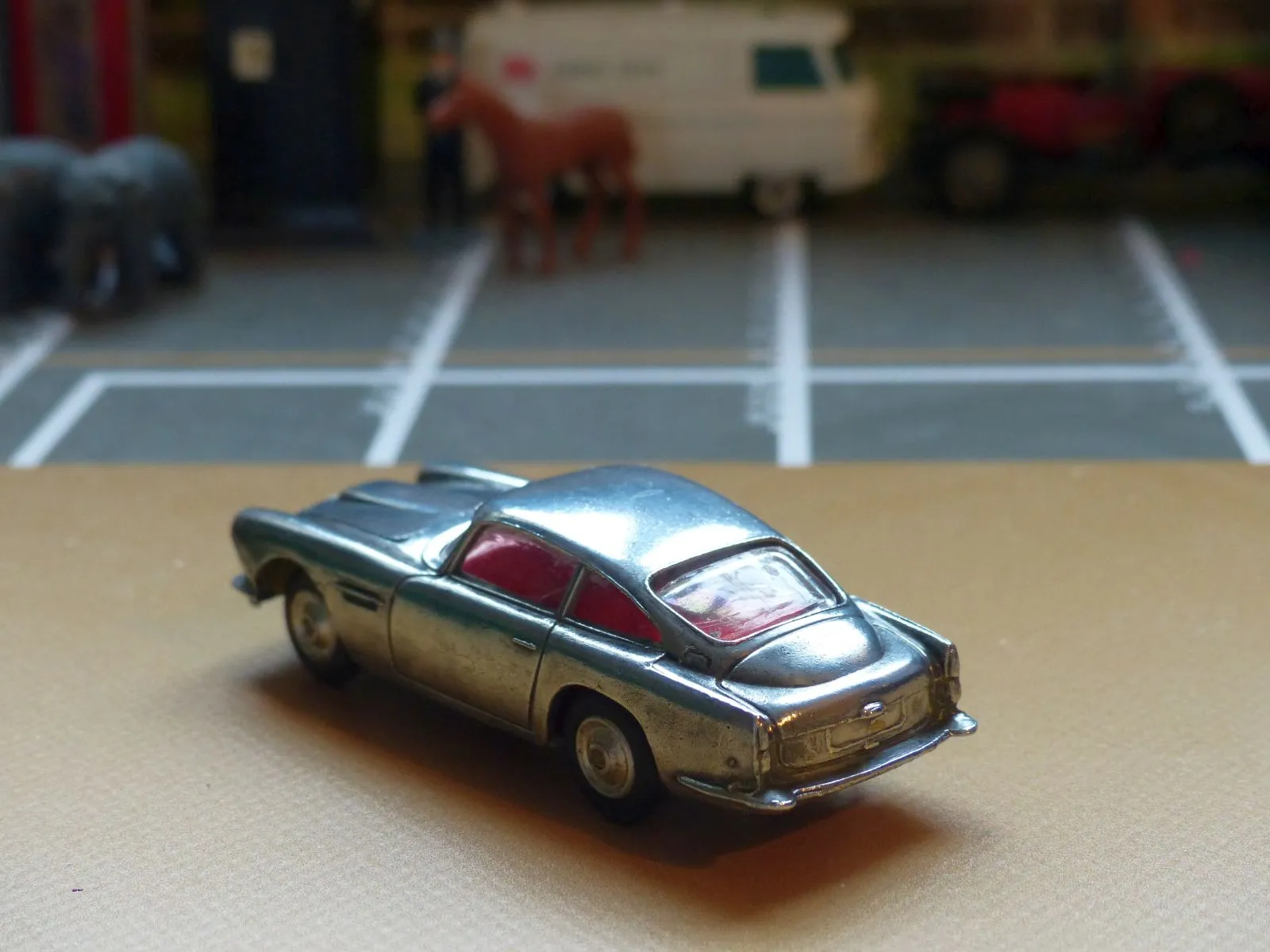 218 Aston Martin in polished bare metal