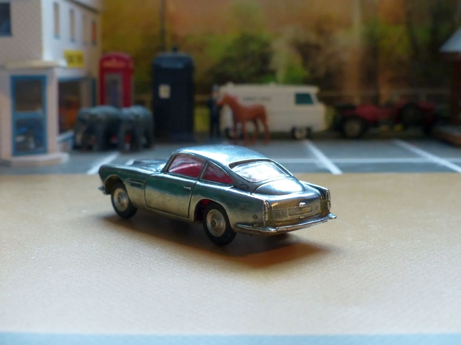 218 Aston Martin in polished bare metal