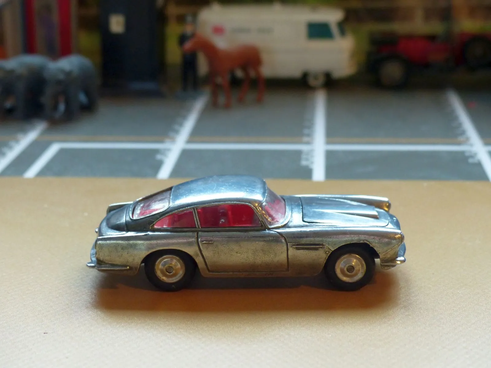 218 Aston Martin in polished bare metal